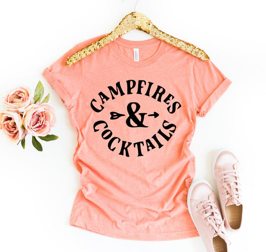 Campfires and Cocktails t-shirt made from soft Bella+Canvas ring-spun cotton with durable print and flattering fit perfect for camping and outdoor lovers
