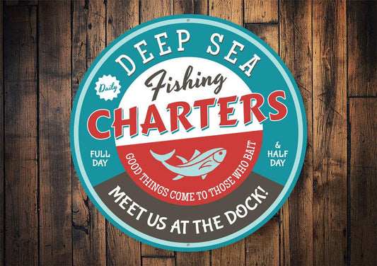 Vintage-style “Deep Sea Fishing Charters” metal sign made of durable aluminum, perfect nautical wall decor for beach houses, cabins, or man caves.