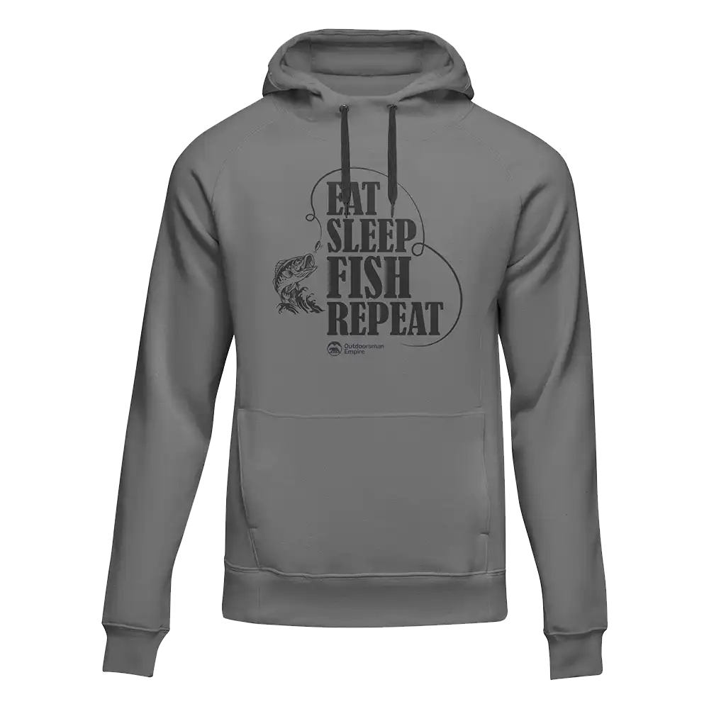 Eat Sleep Fish Repeat hoodie with bold fishing-themed design. Midweight unisex fit made from soft 50/50 cotton-poly blend. Ideal for anglers—comfortable, conversation-starting, and great for year-round wear.