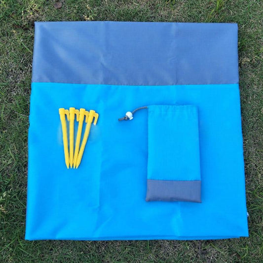 waterproof sand resistant blanket 82 x 78 inches made from quick dry breathable nylon includes carry bag and corner stakes lightweight and compact for beach camping park or outdoor adventures